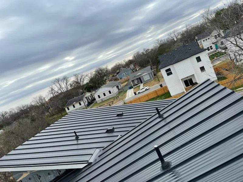 Standing seam metal roof panels with vents for Skylight Repair in Portage